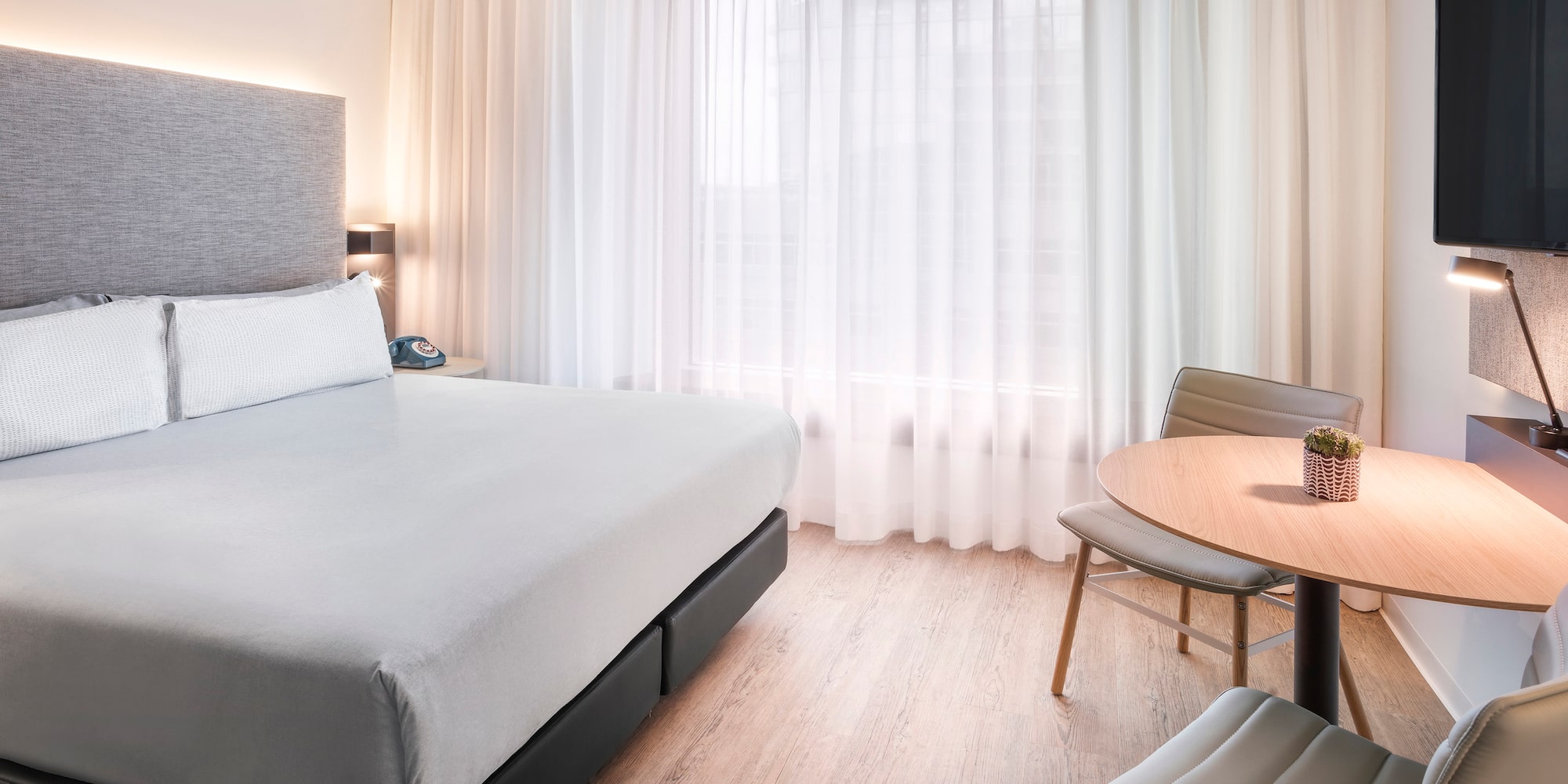 a room with a bed and a table