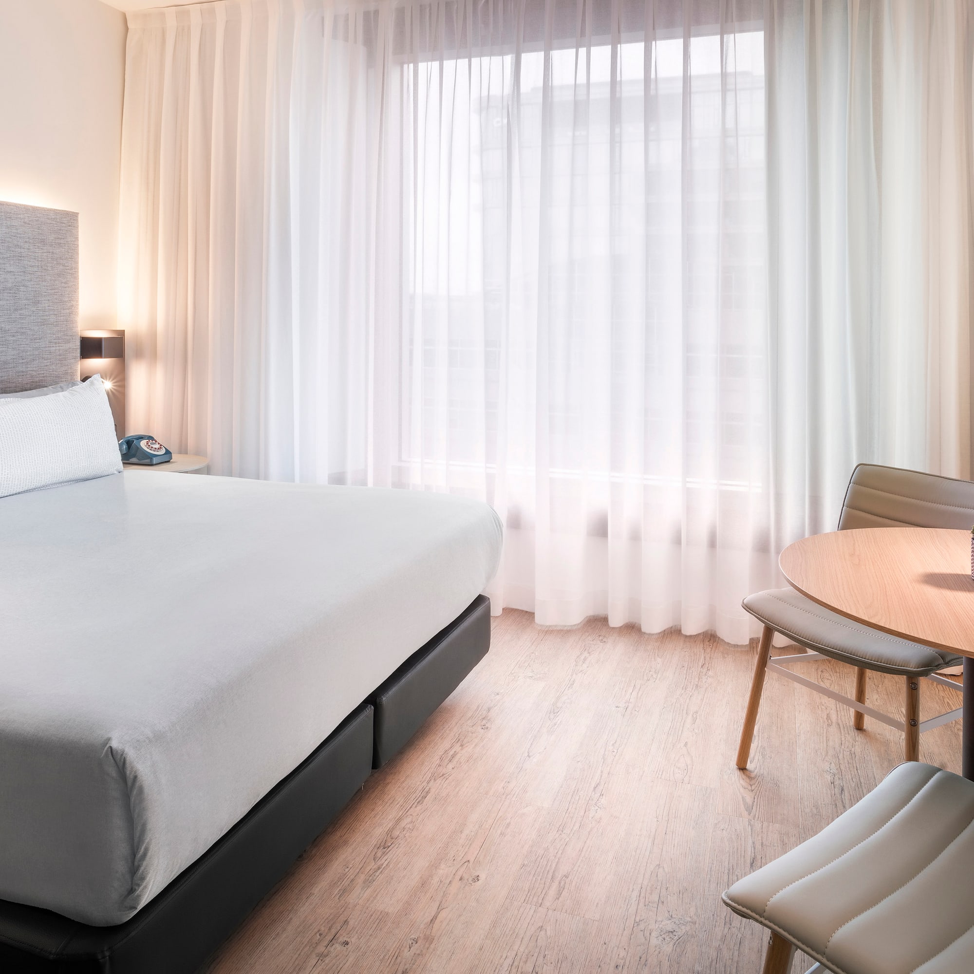 a room with a bed and a table