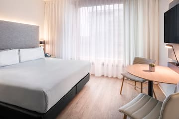 a room with a bed and a table