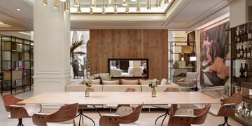 a room with a table and chairs