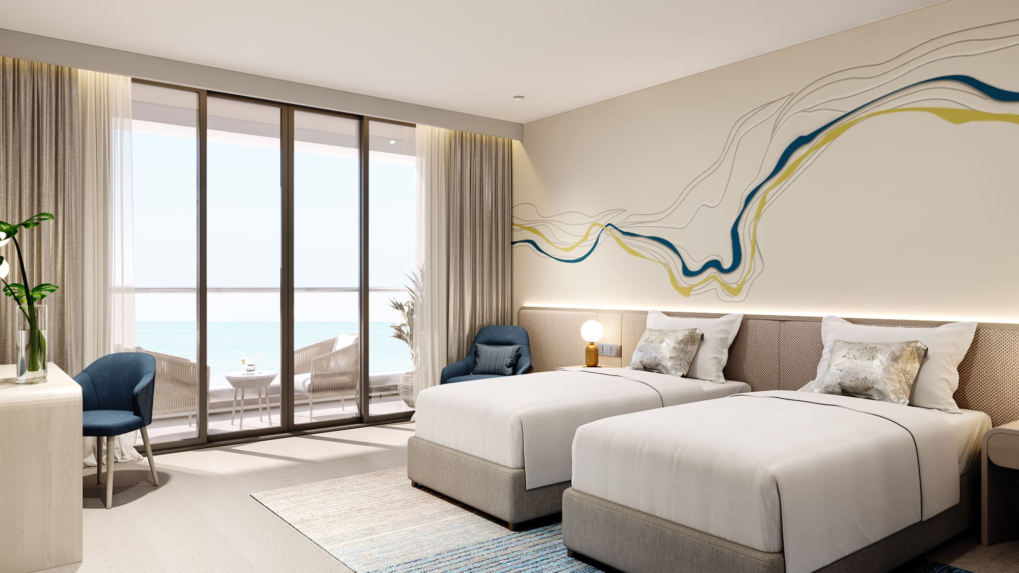 a room with two beds and a view of the ocean