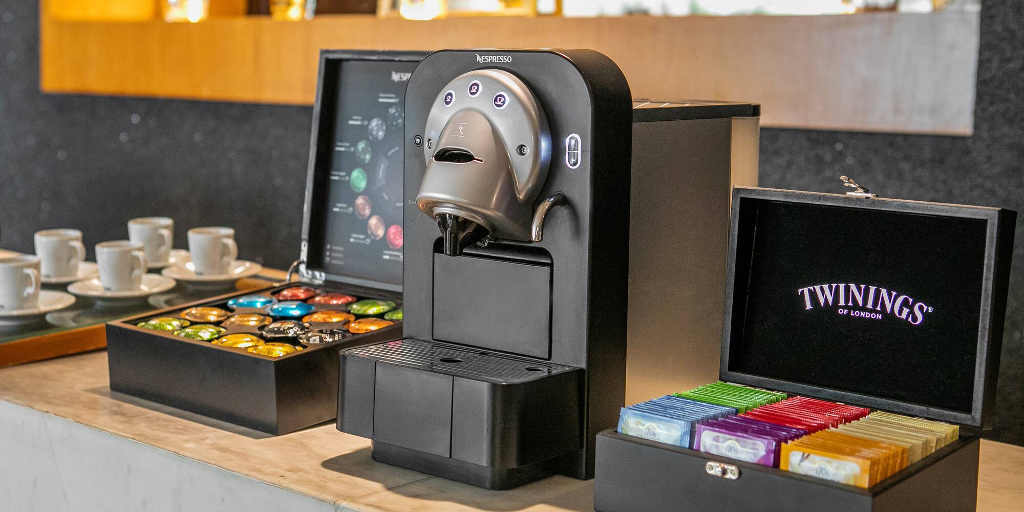 a coffee machine and a box of coffee