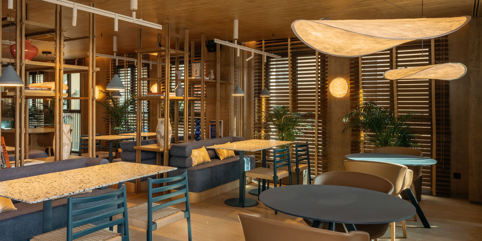 a room with tables and chairs