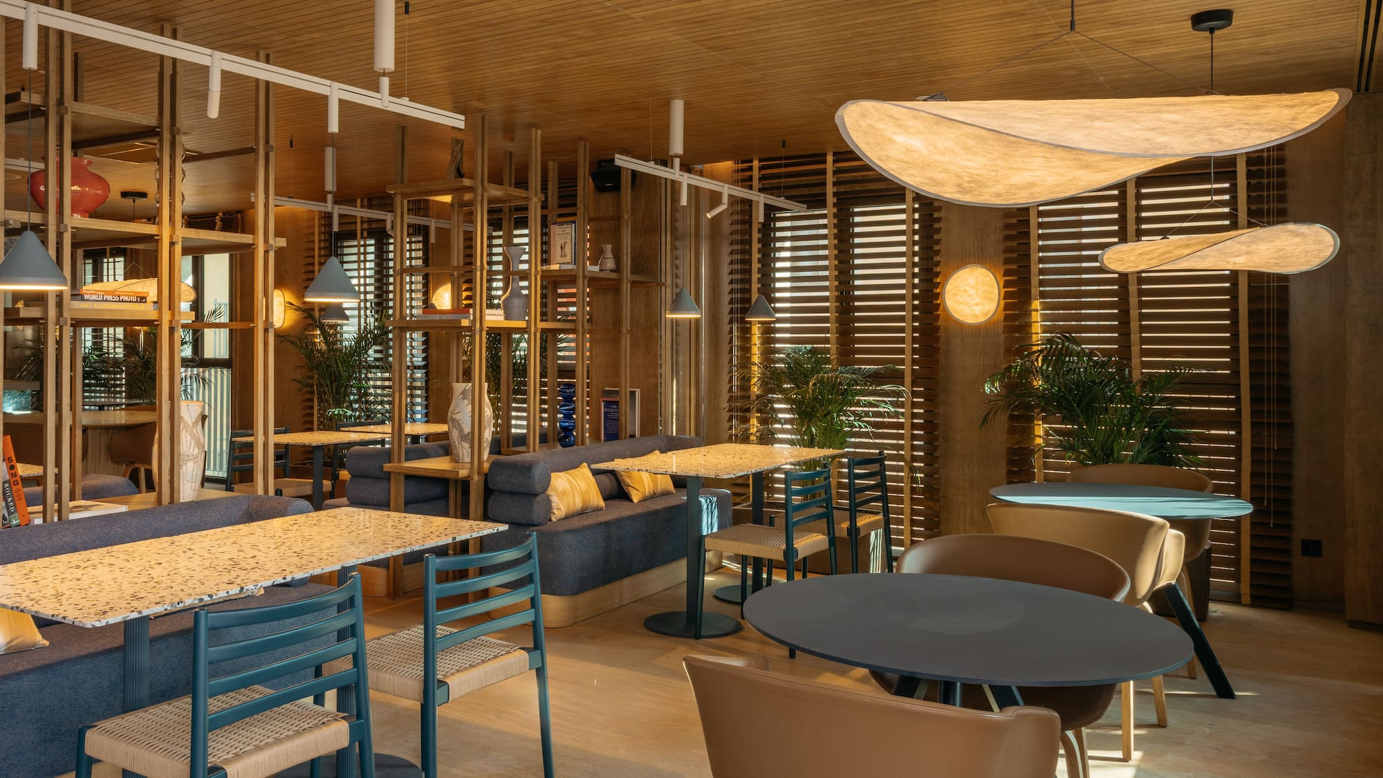 a room with tables and chairs