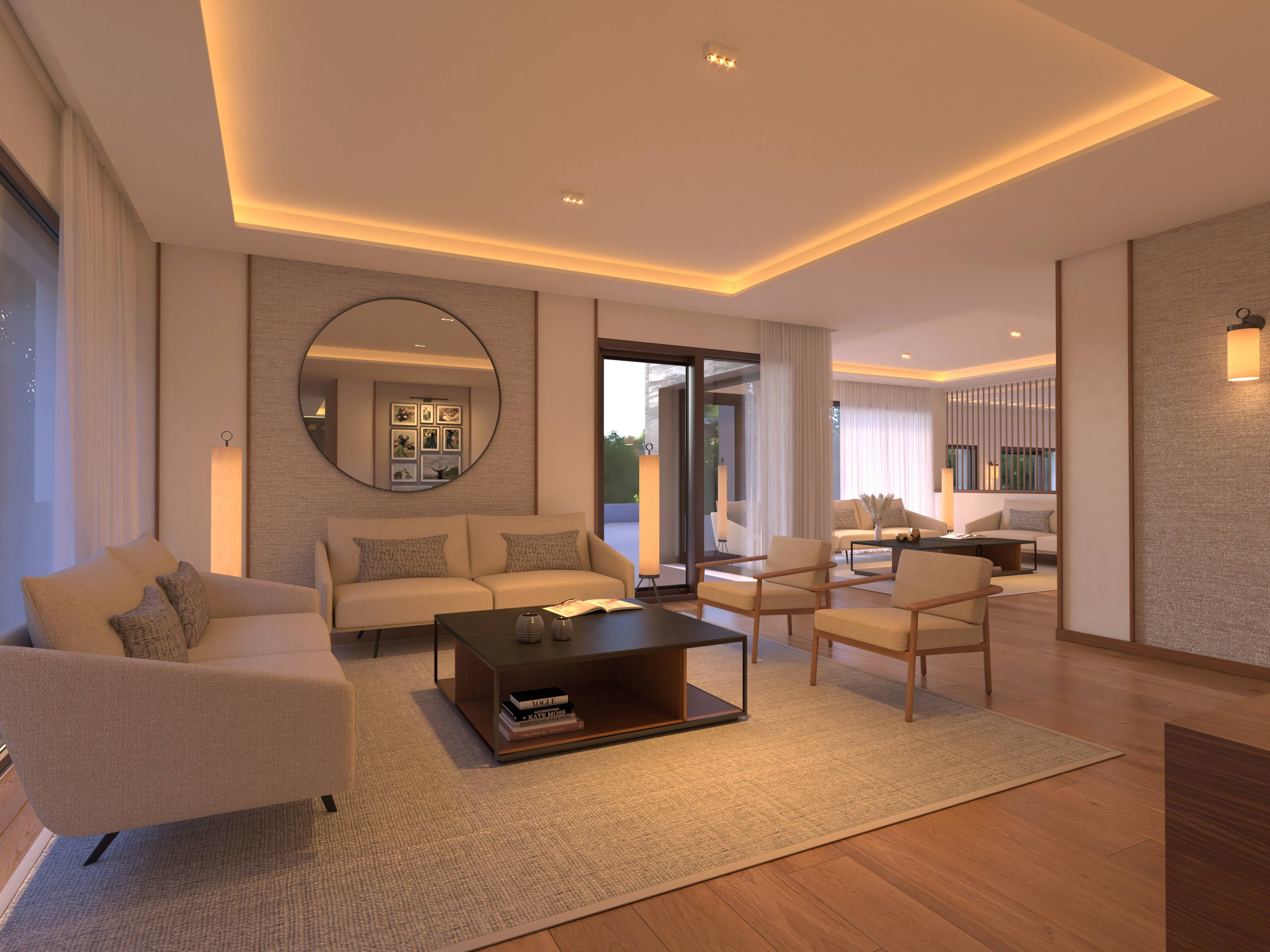 Sala de estar moderna y luminosa con sofás beige, mesa de centro y espejo redondo. - Hotel Golf Santa Ponsa Meliá Collection, Mallorca