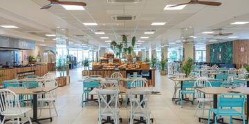 a room with tables and chairs