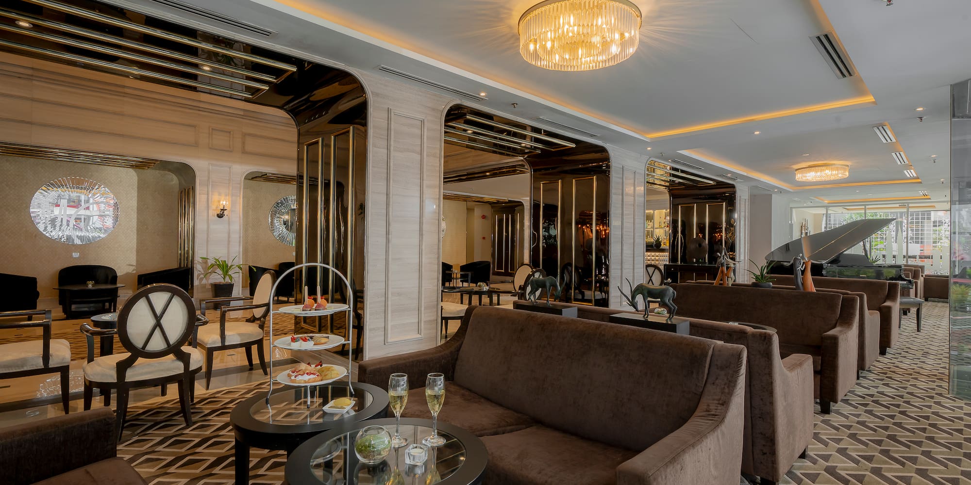 a room with couches and tables and chairs