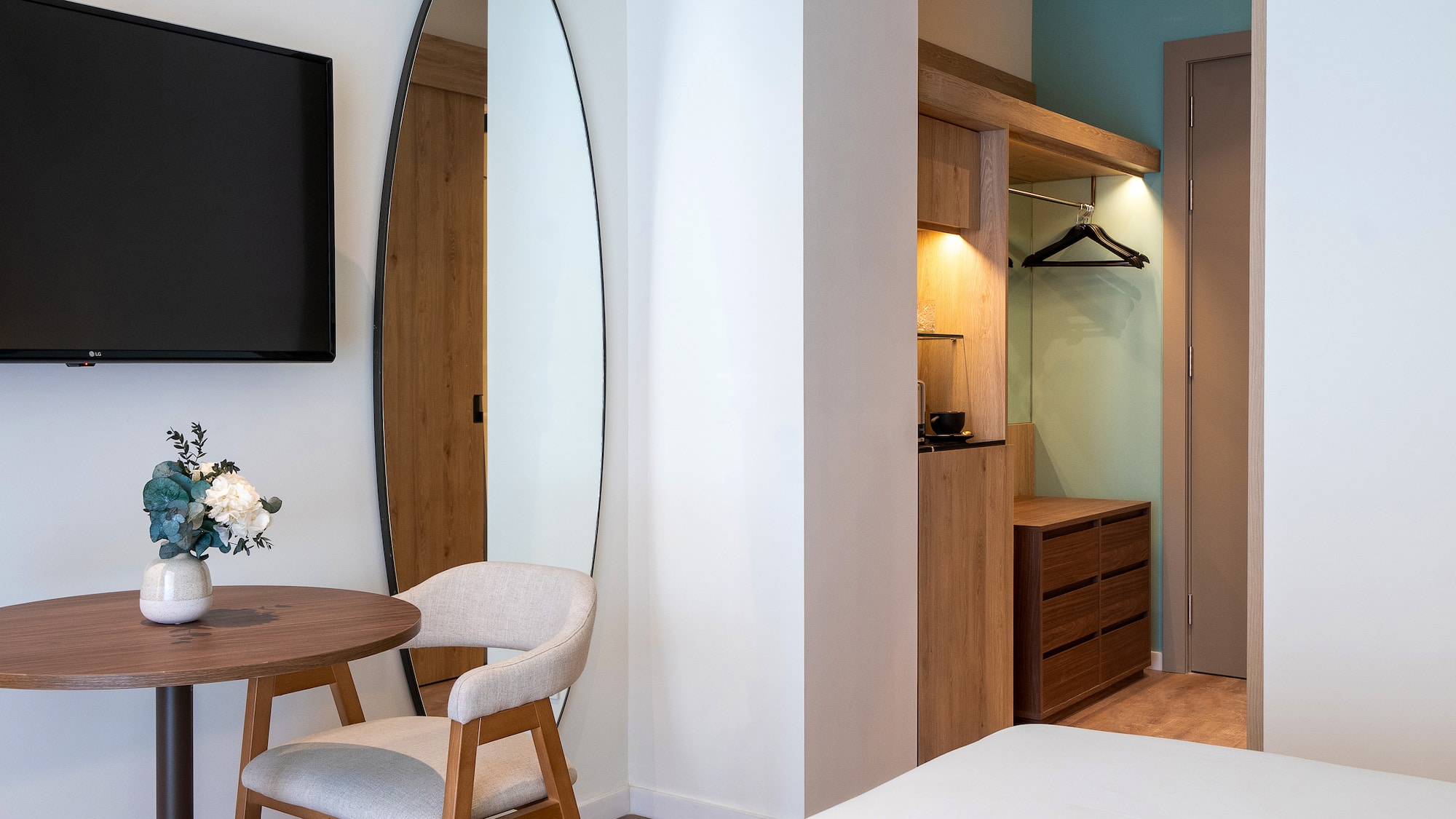 a room with a mirror and a table