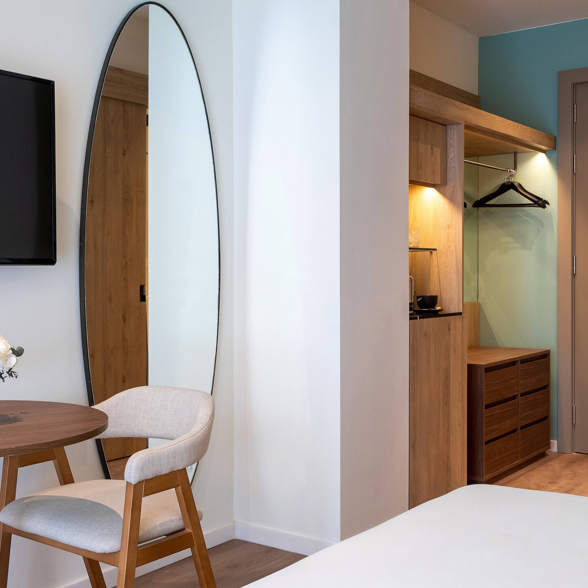 a room with a mirror and a table