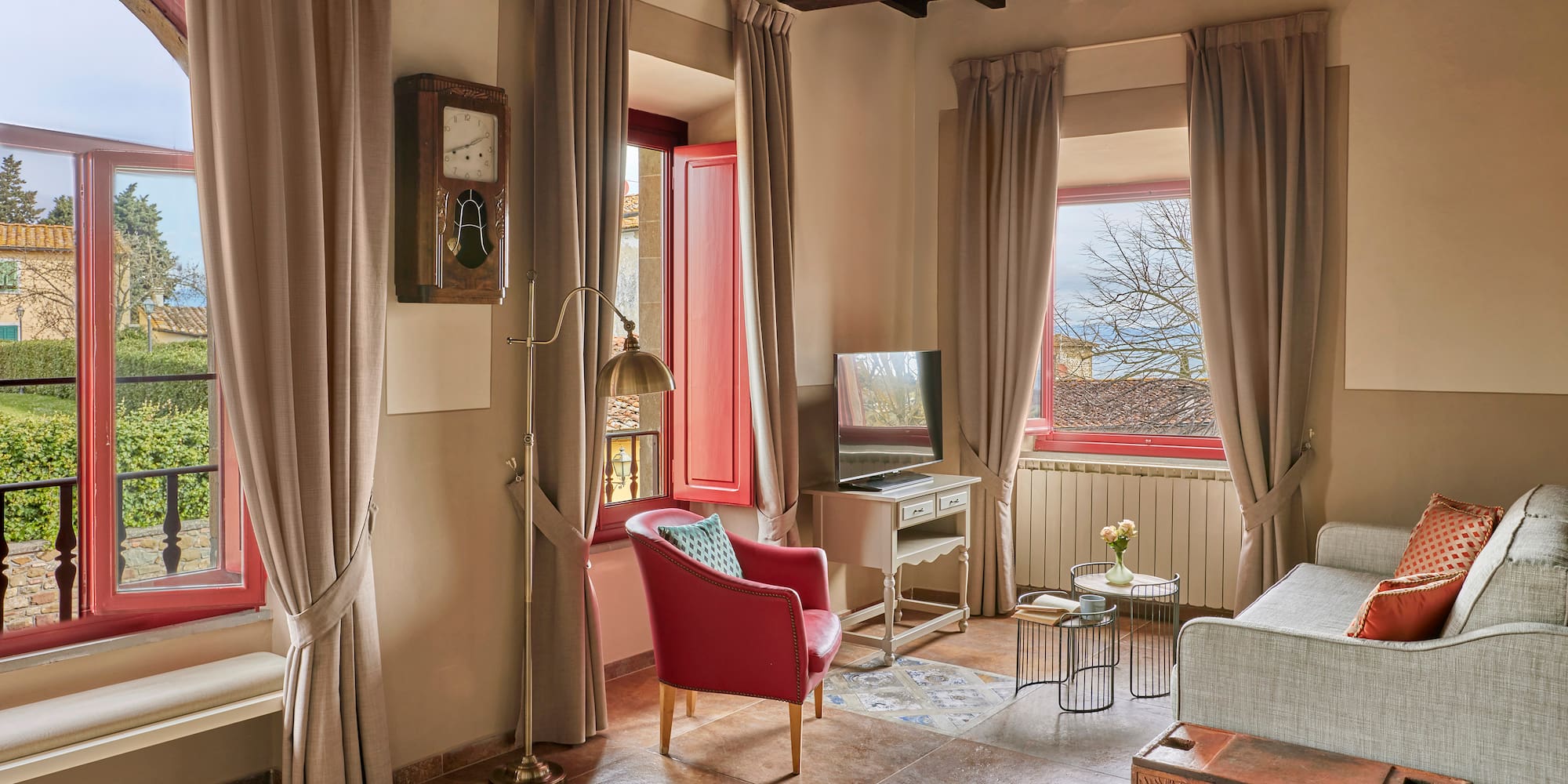 a living room with a couch and a tv