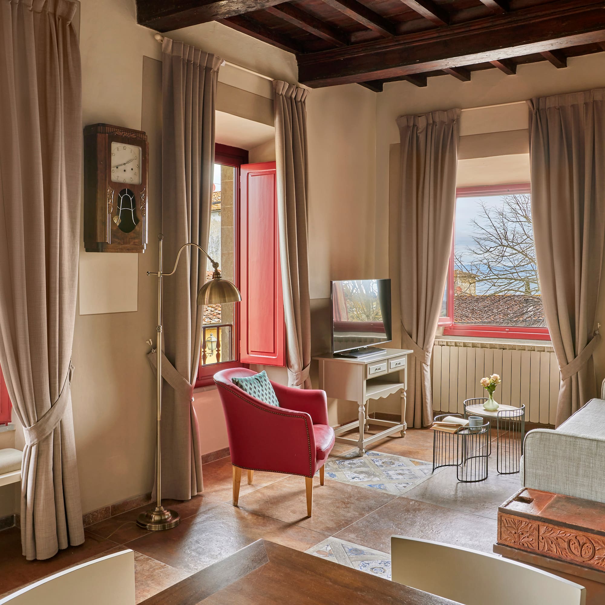 a living room with a couch and a tv