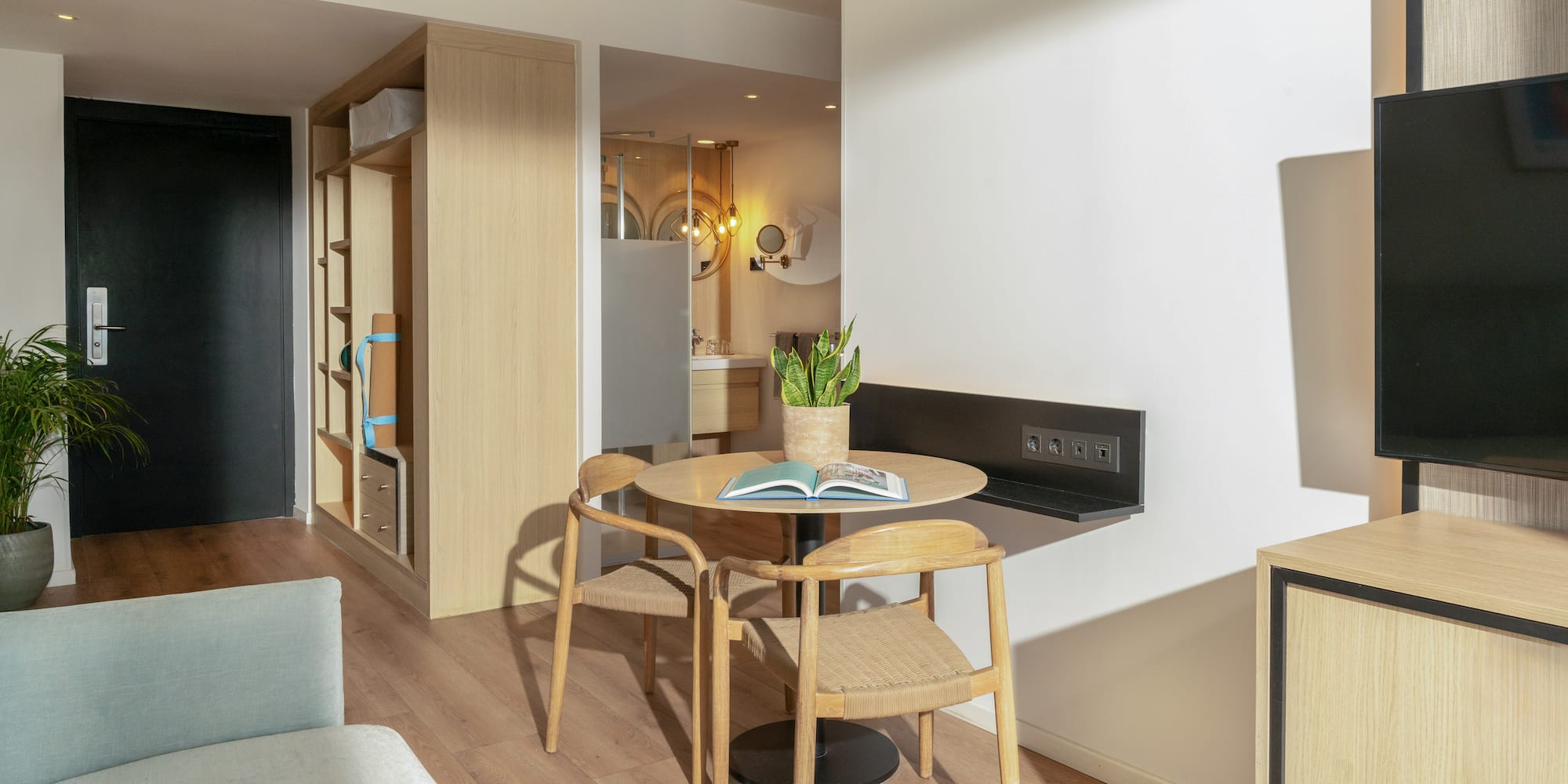 a room with a table and chairs