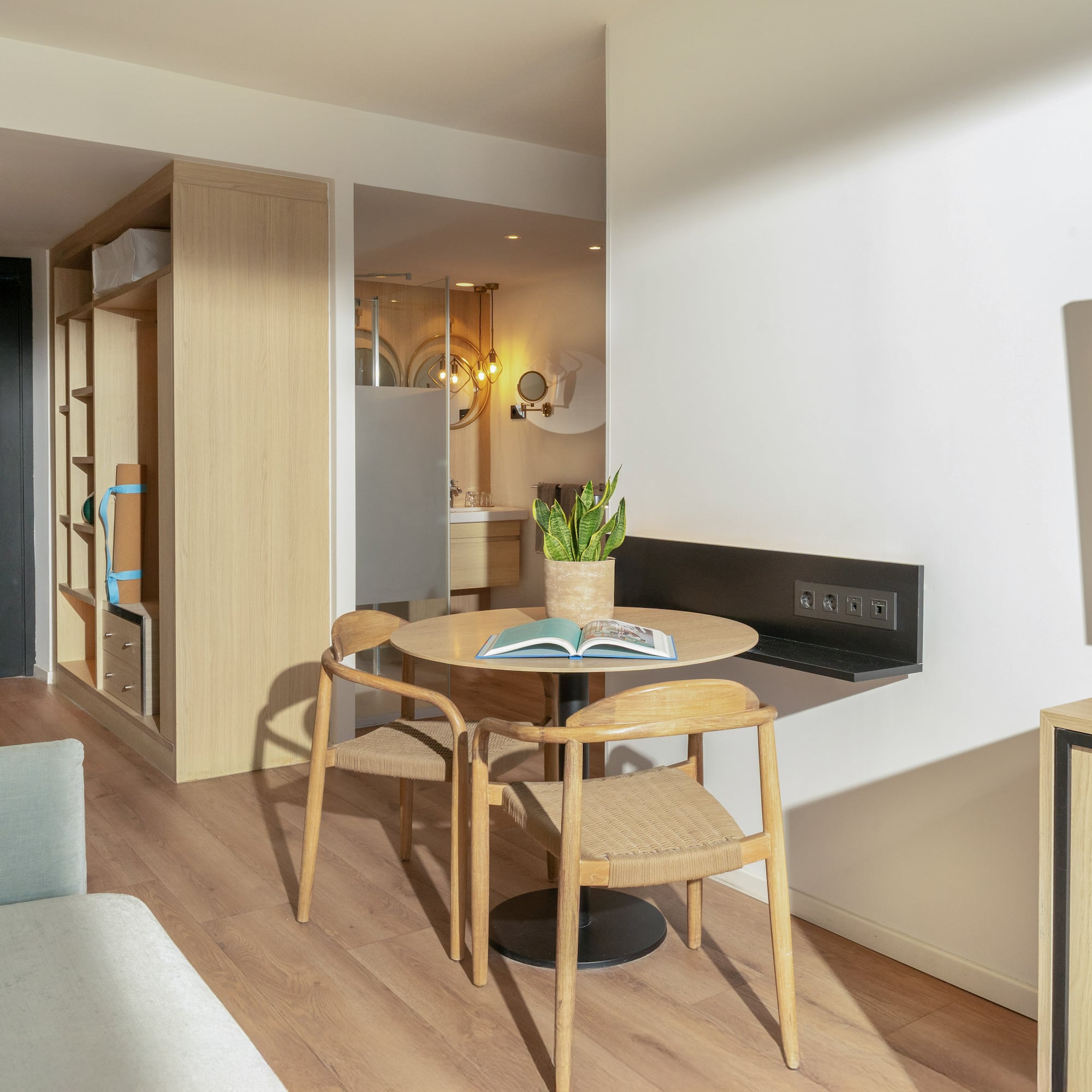 a room with a table and chairs