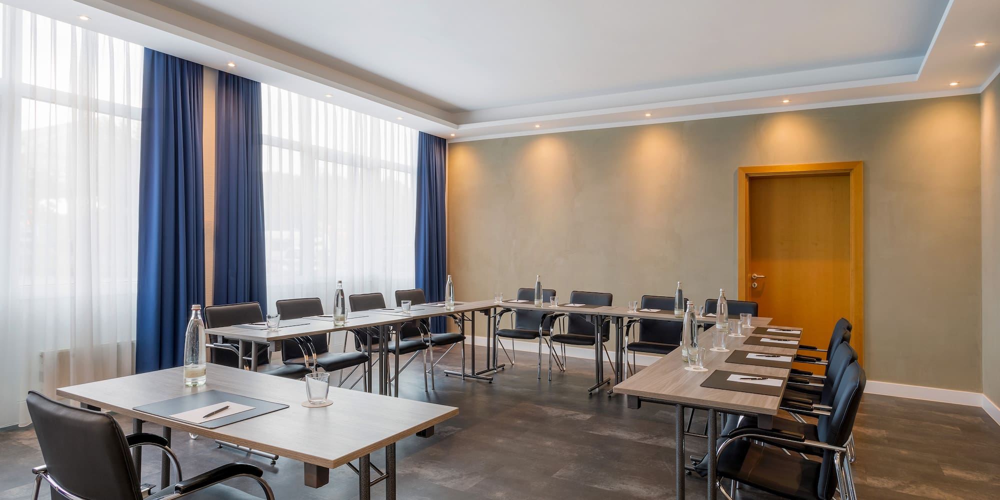 a room with tables and chairs