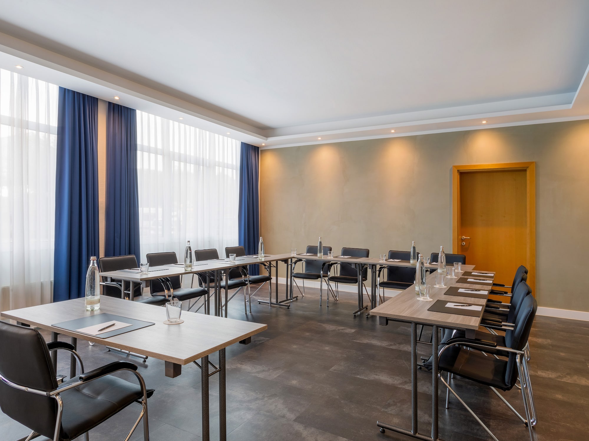 a room with tables and chairs