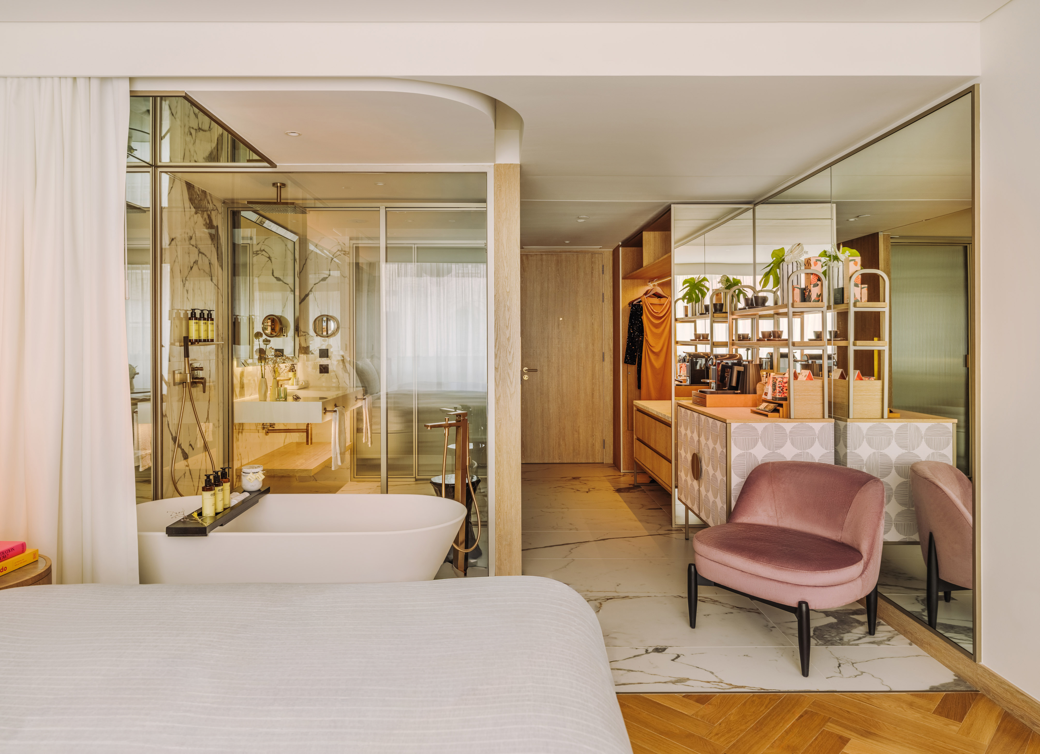 a bathroom with a tub and a bathtub