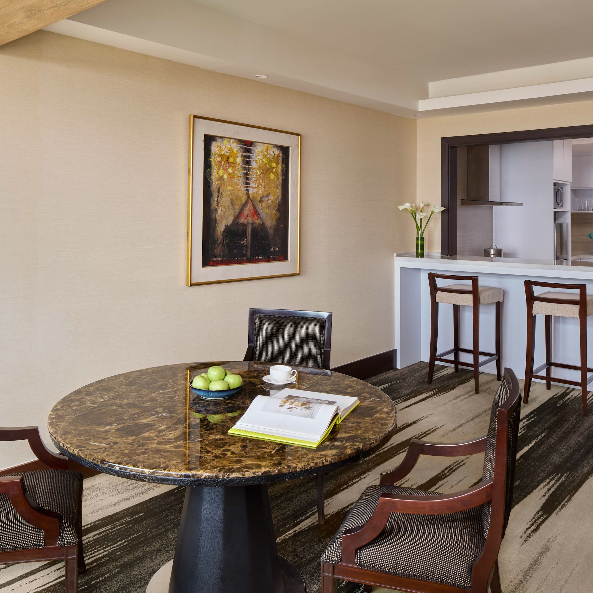 a room with a table and chairs