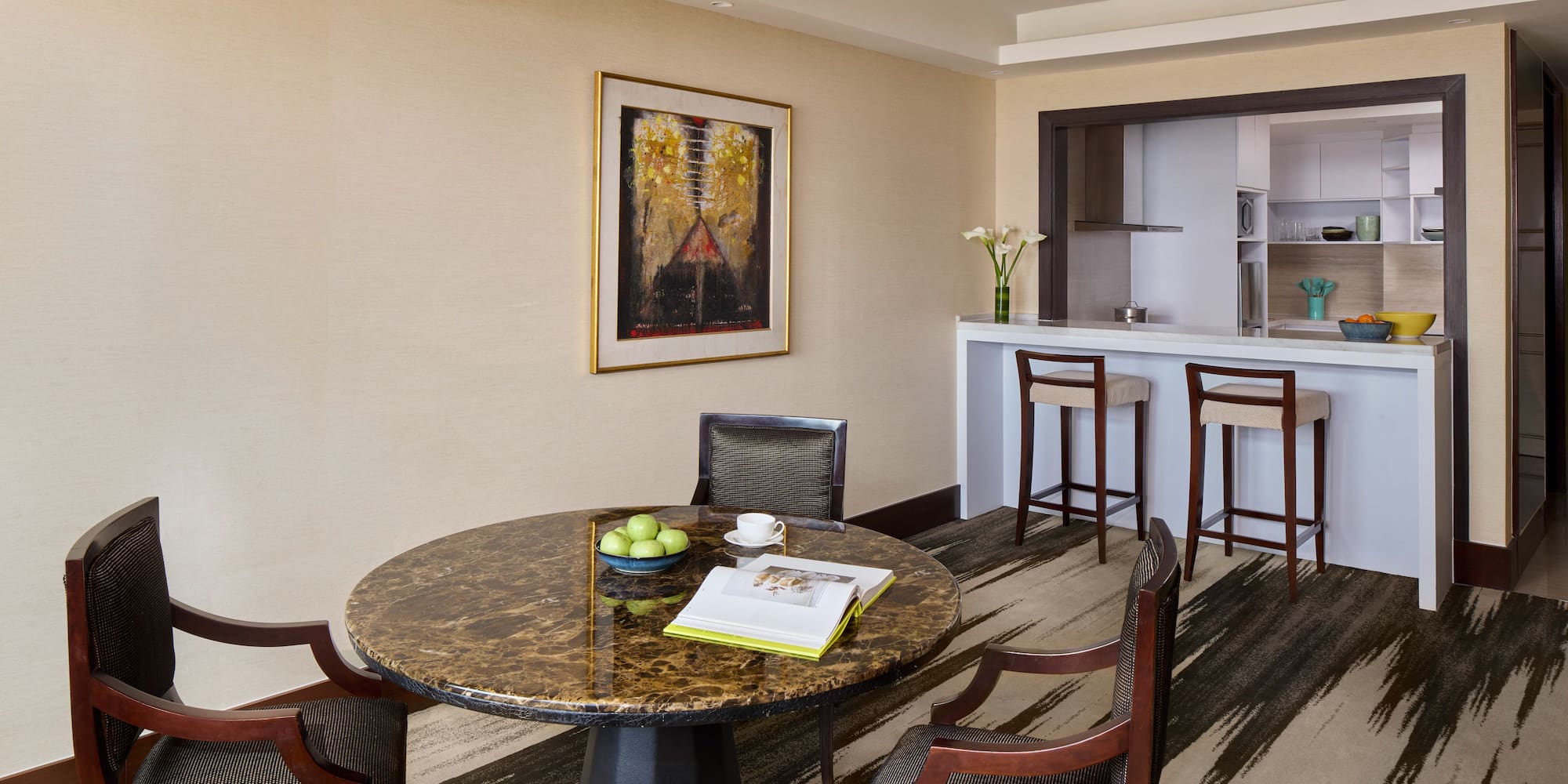 a room with a table and chairs