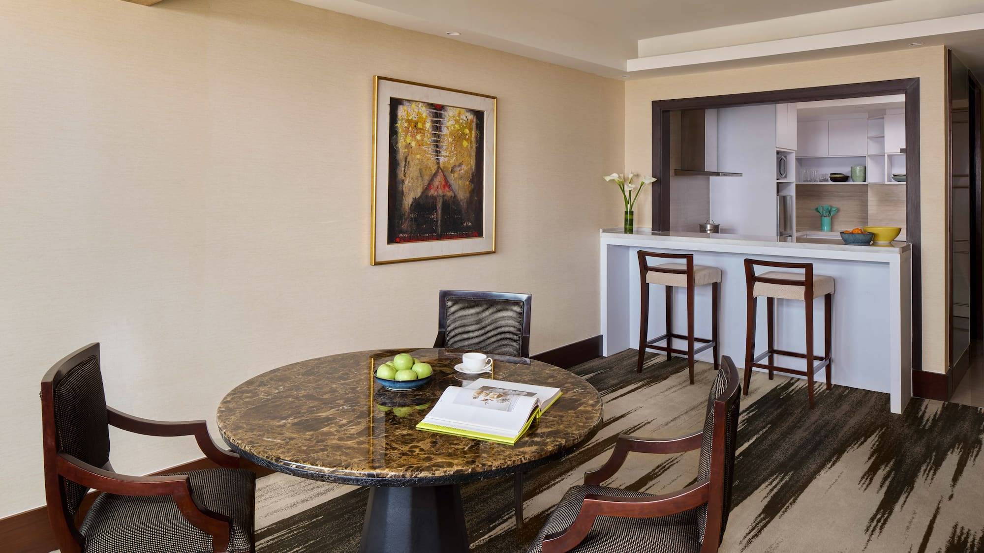 a room with a table and chairs