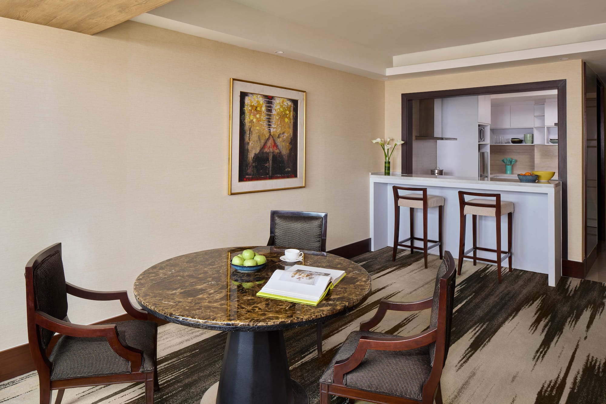 a room with a table and chairs