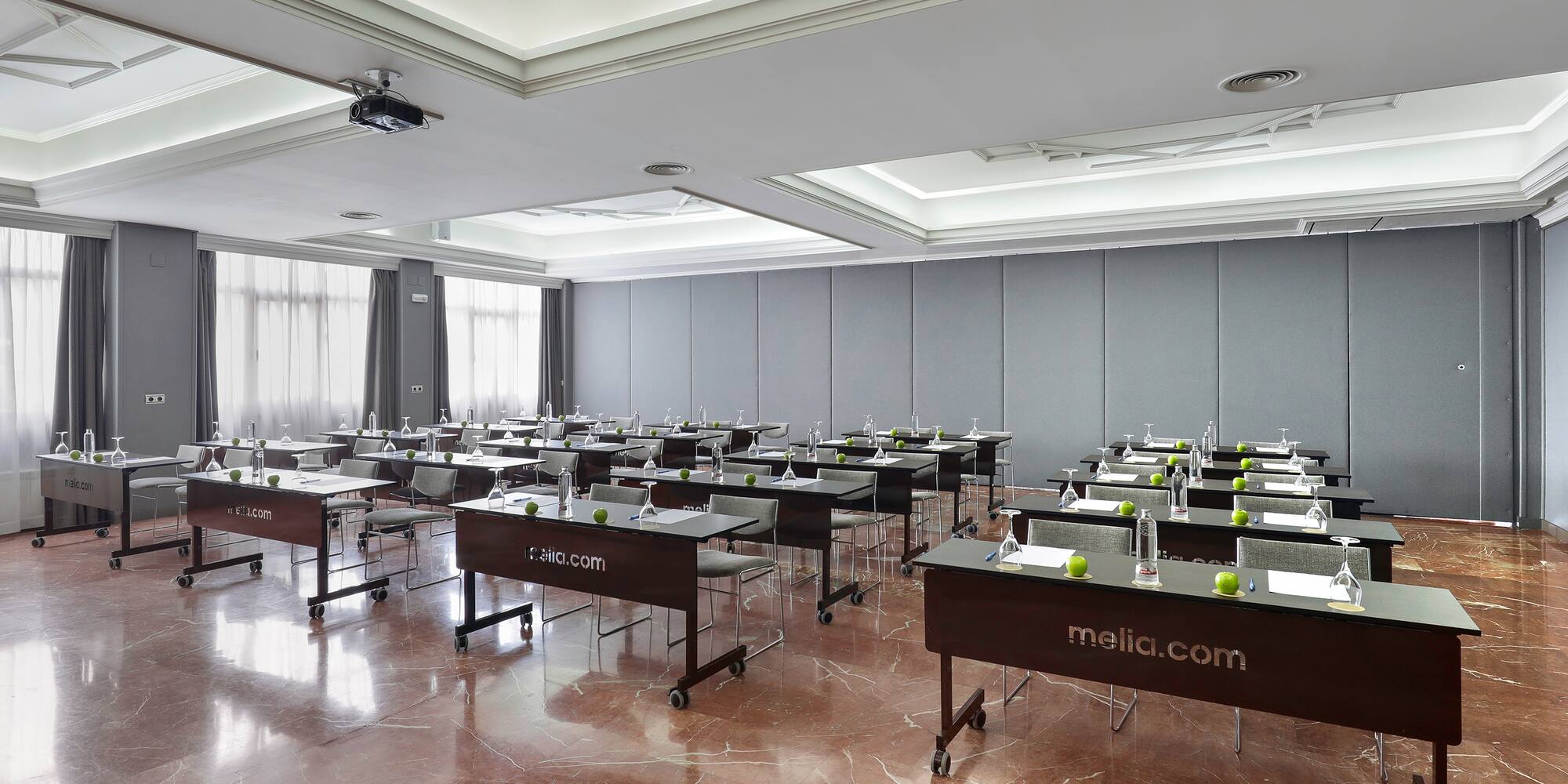 a room with tables and chairs