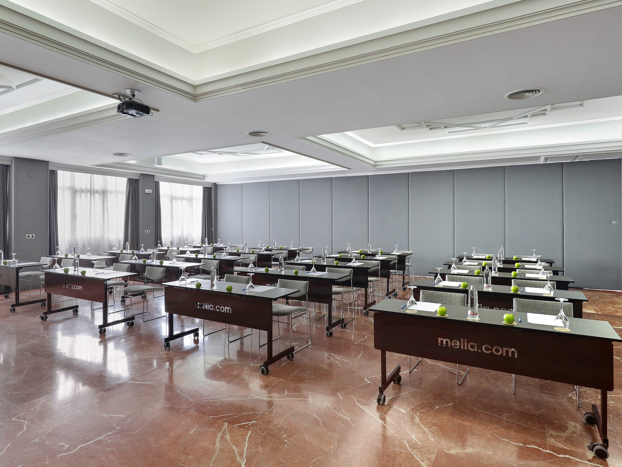 a room with tables and chairs