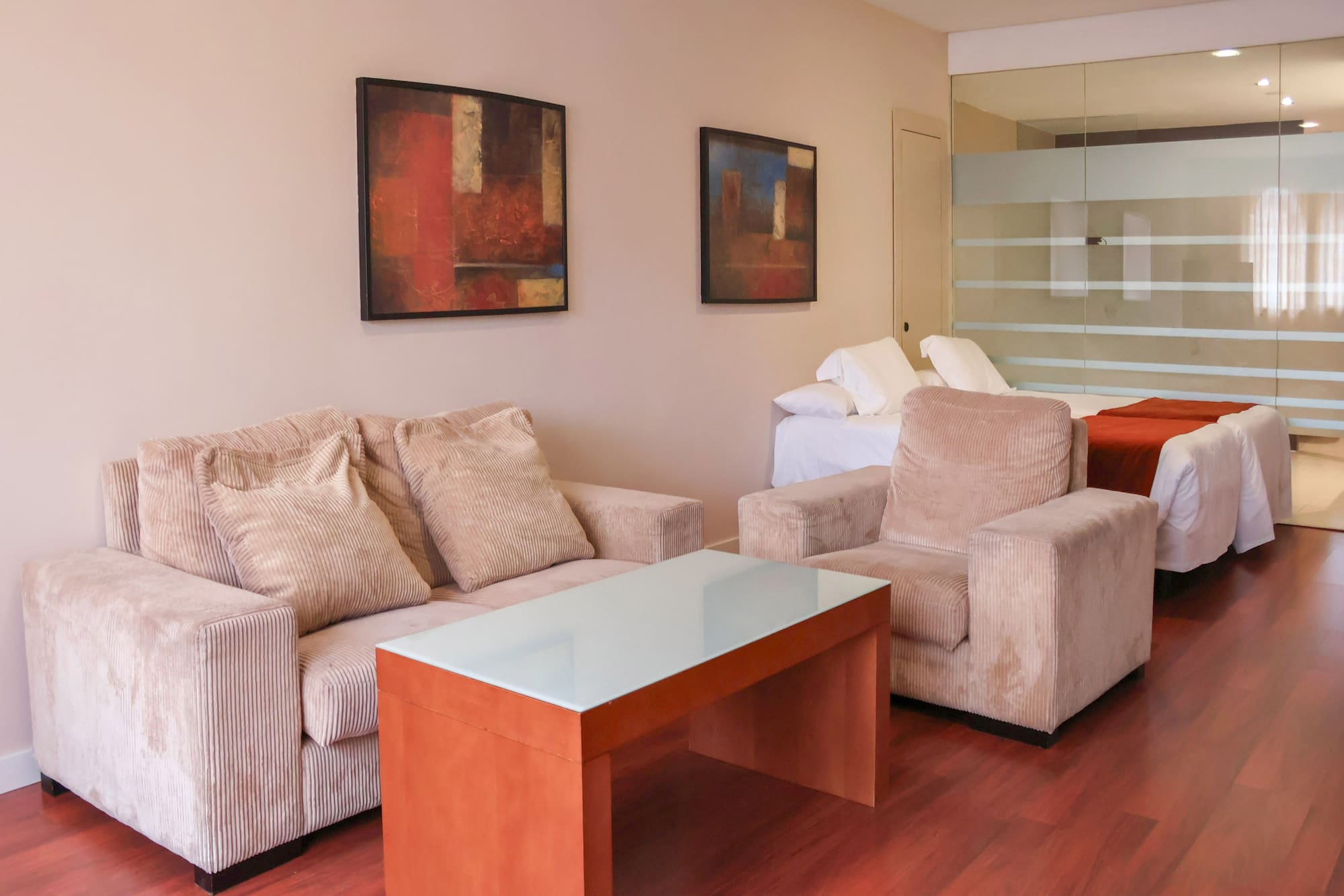 a room with couches and a table