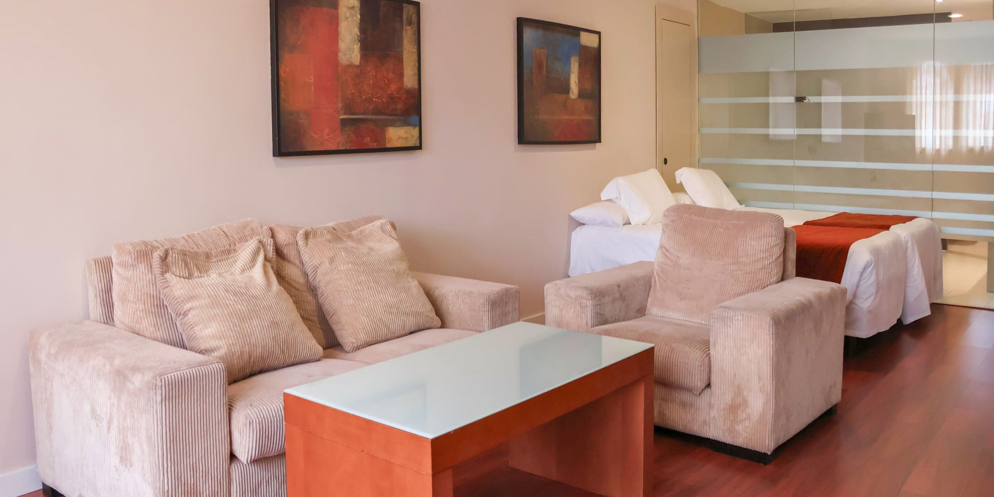 a room with couches and a table