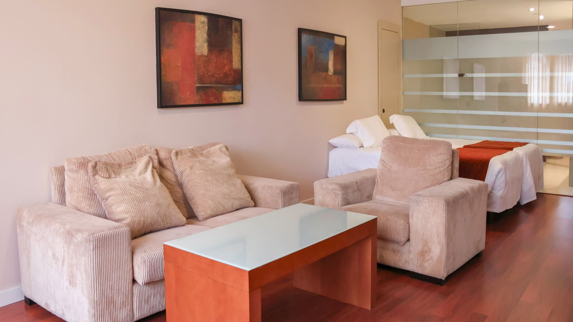 a room with couches and a table