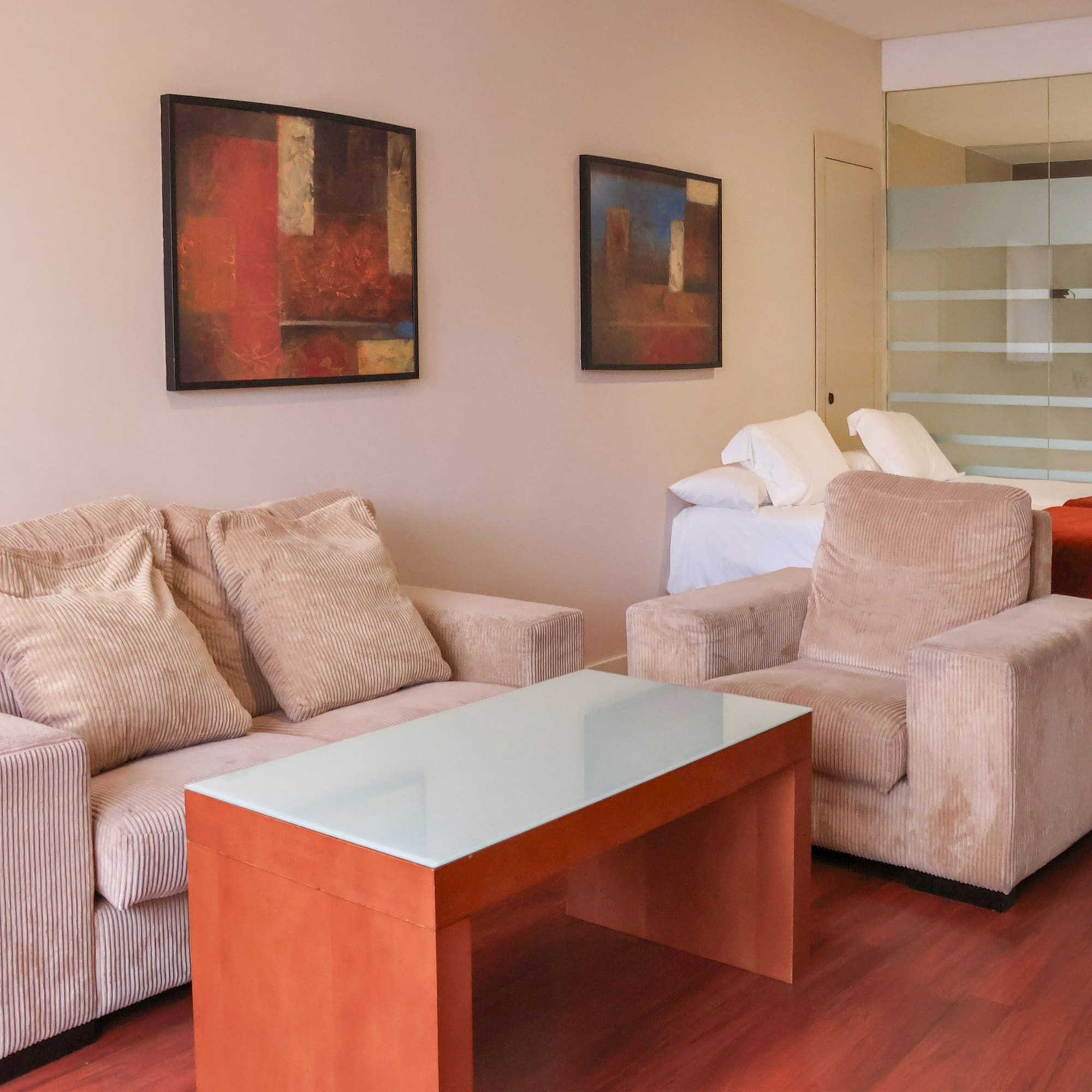 a room with couches and a table