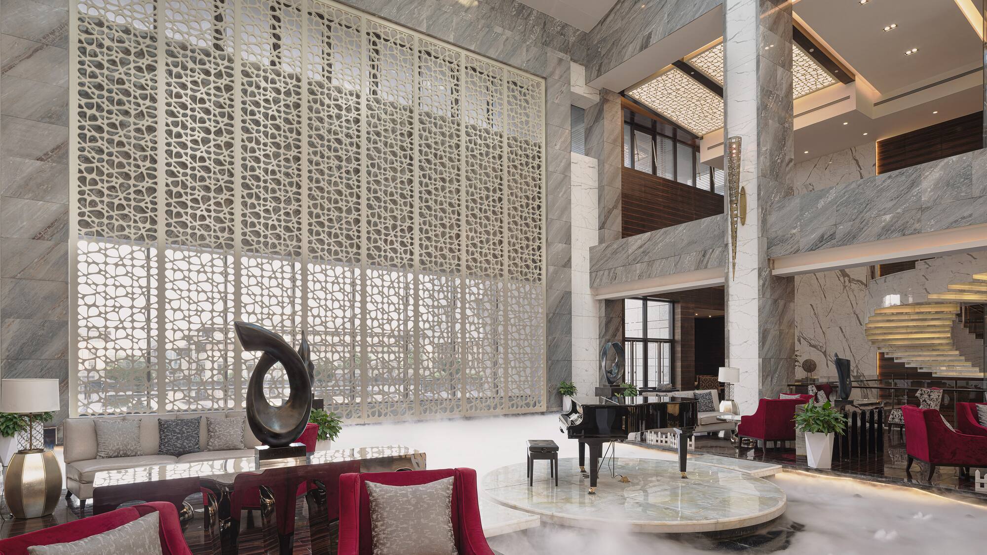 a room with a piano and a piano in it