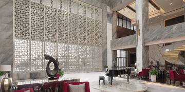 a room with a piano and a piano in it