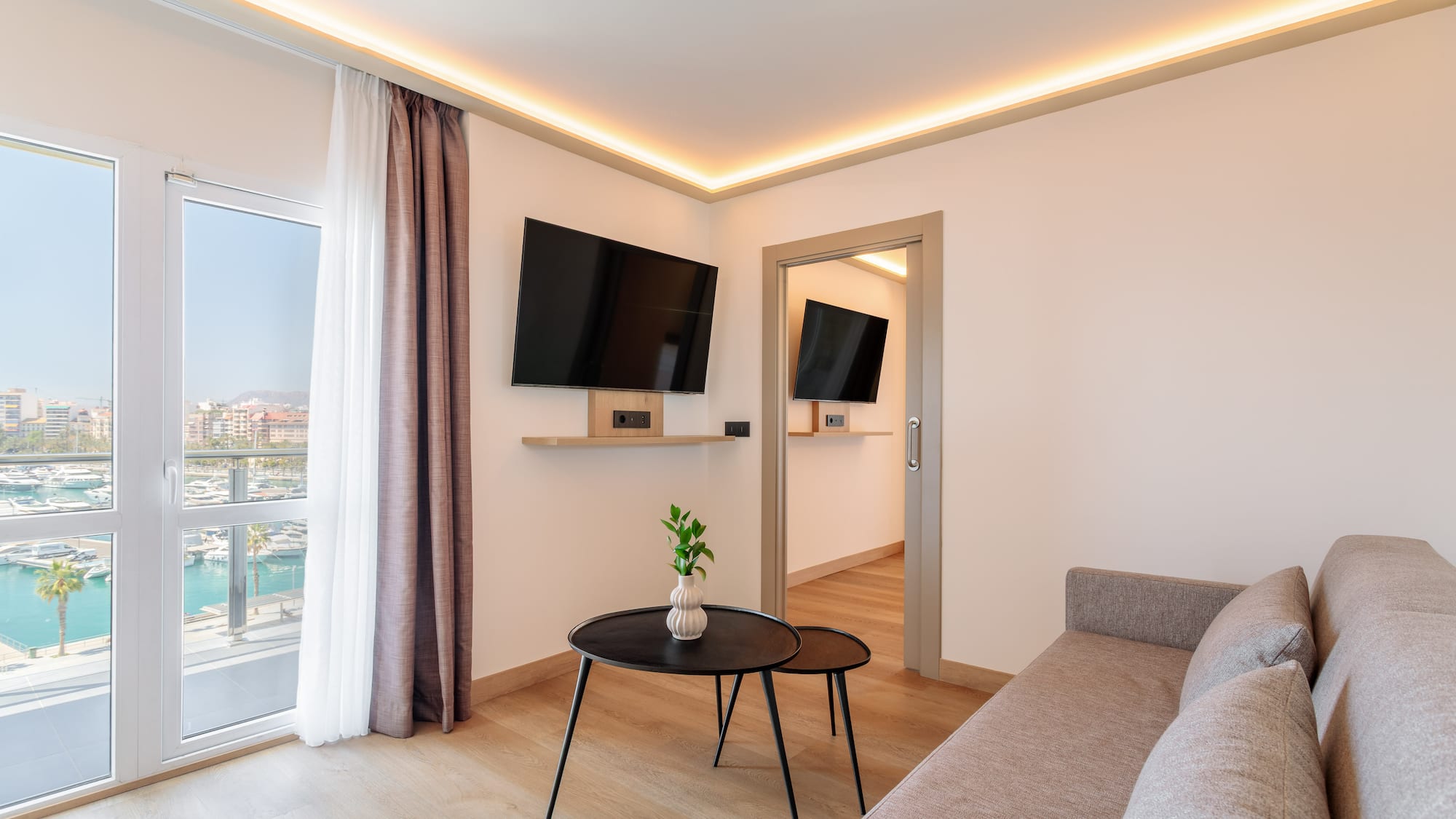 a living room with a couch and tv