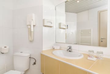 a bathroom with a sink and toilet