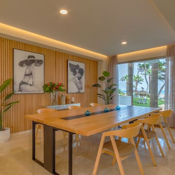 a room with a table and chairs