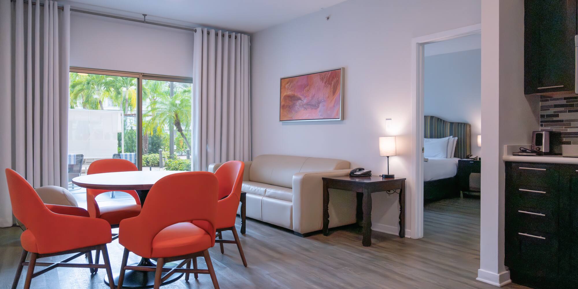 a room with a table and chairs