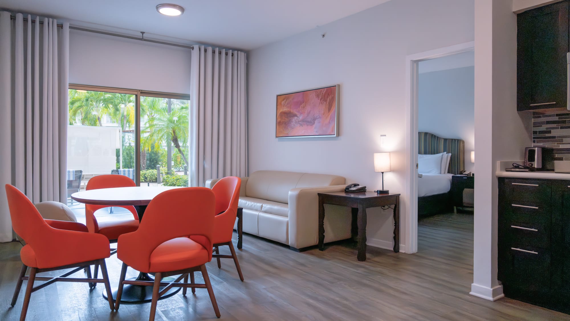 a room with a table and chairs