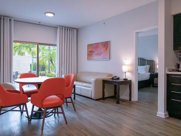 a room with a table and chairs