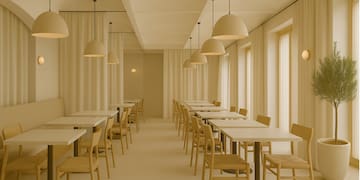 a room with tables and chairs