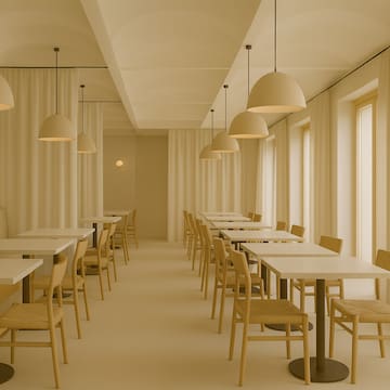 a room with tables and chairs