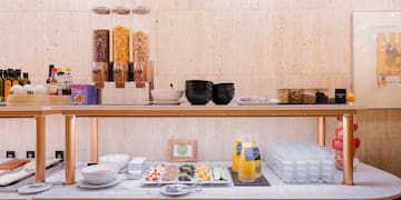 a buffet table with food and drinks