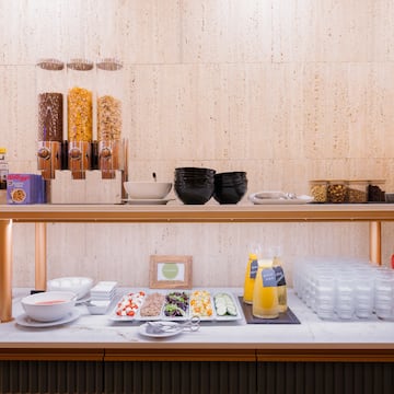 a buffet table with food and drinks