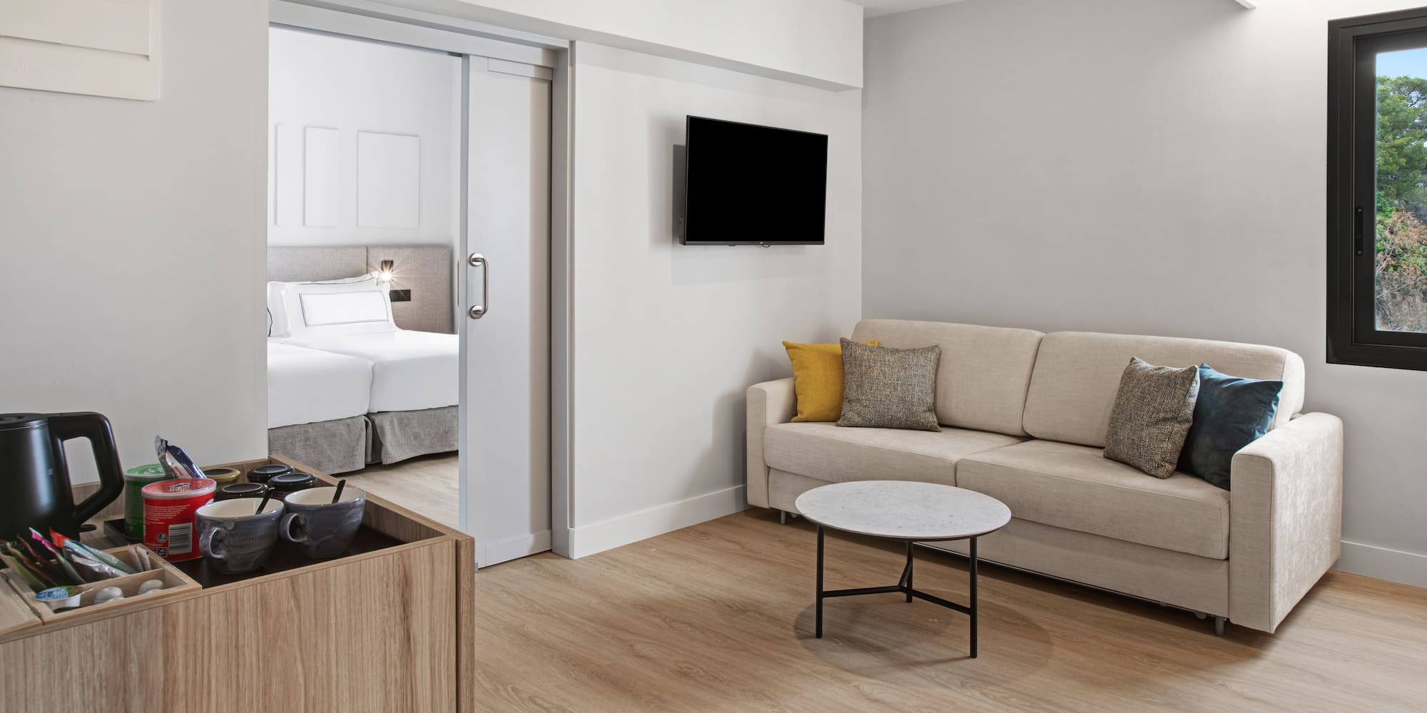 a room with a couch and a tv