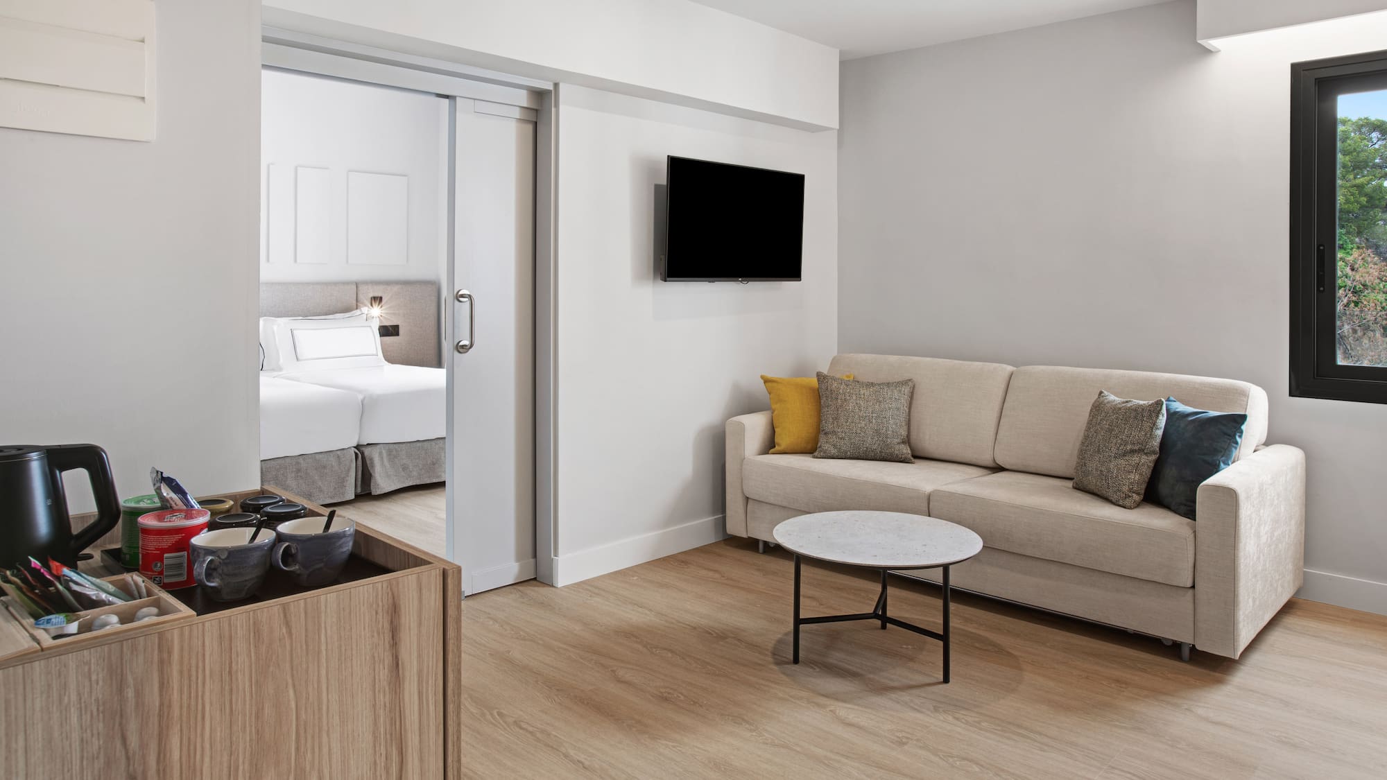 a room with a couch and a tv