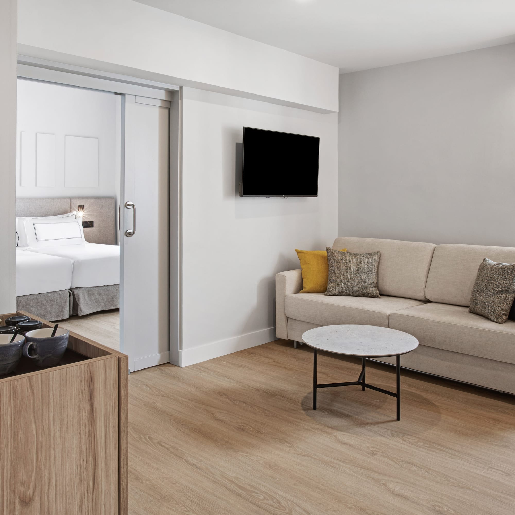 a room with a couch and a tv