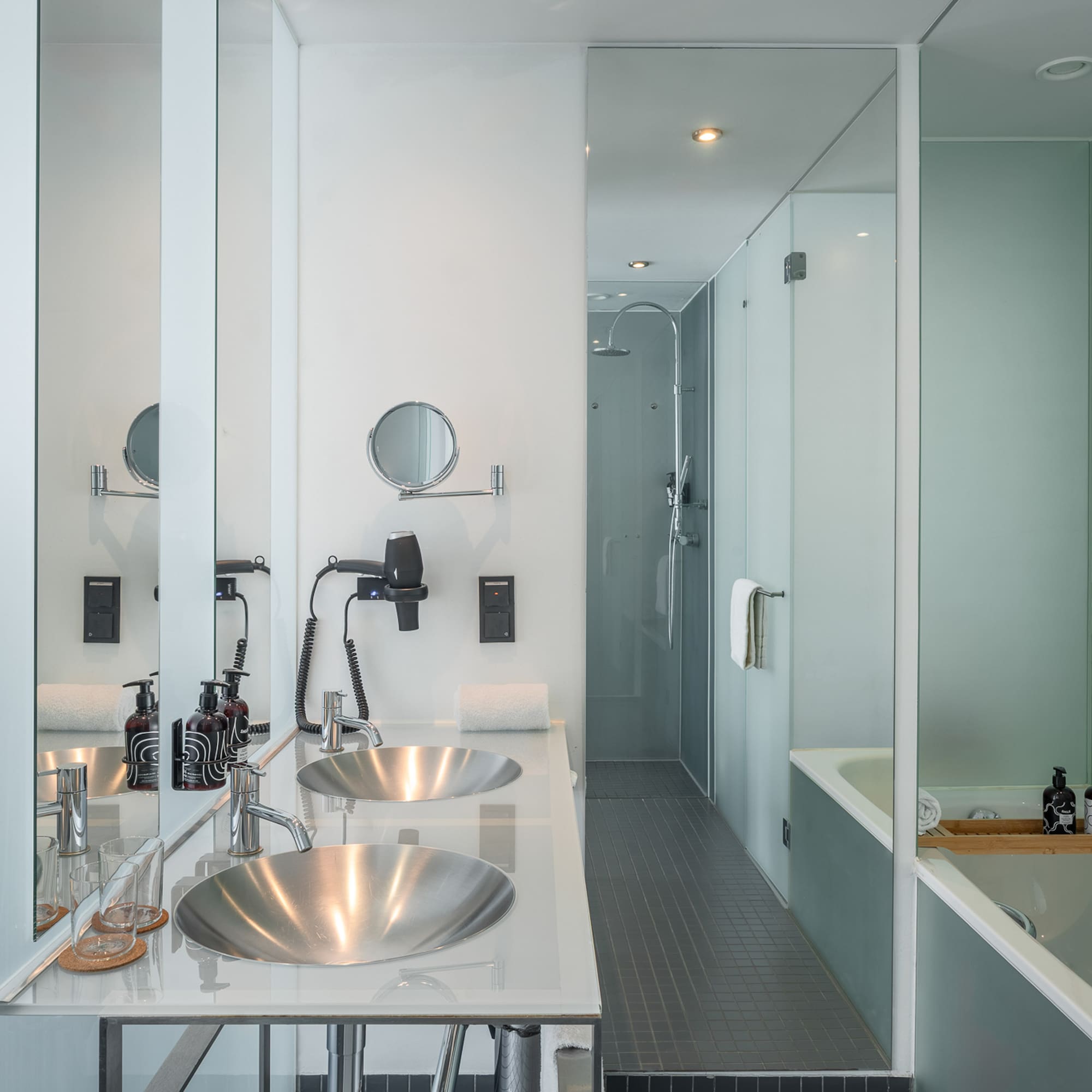 a bathroom with a shower and sink