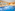 Luxurious indoor spa pool with two jacuzzis and soft lighting.