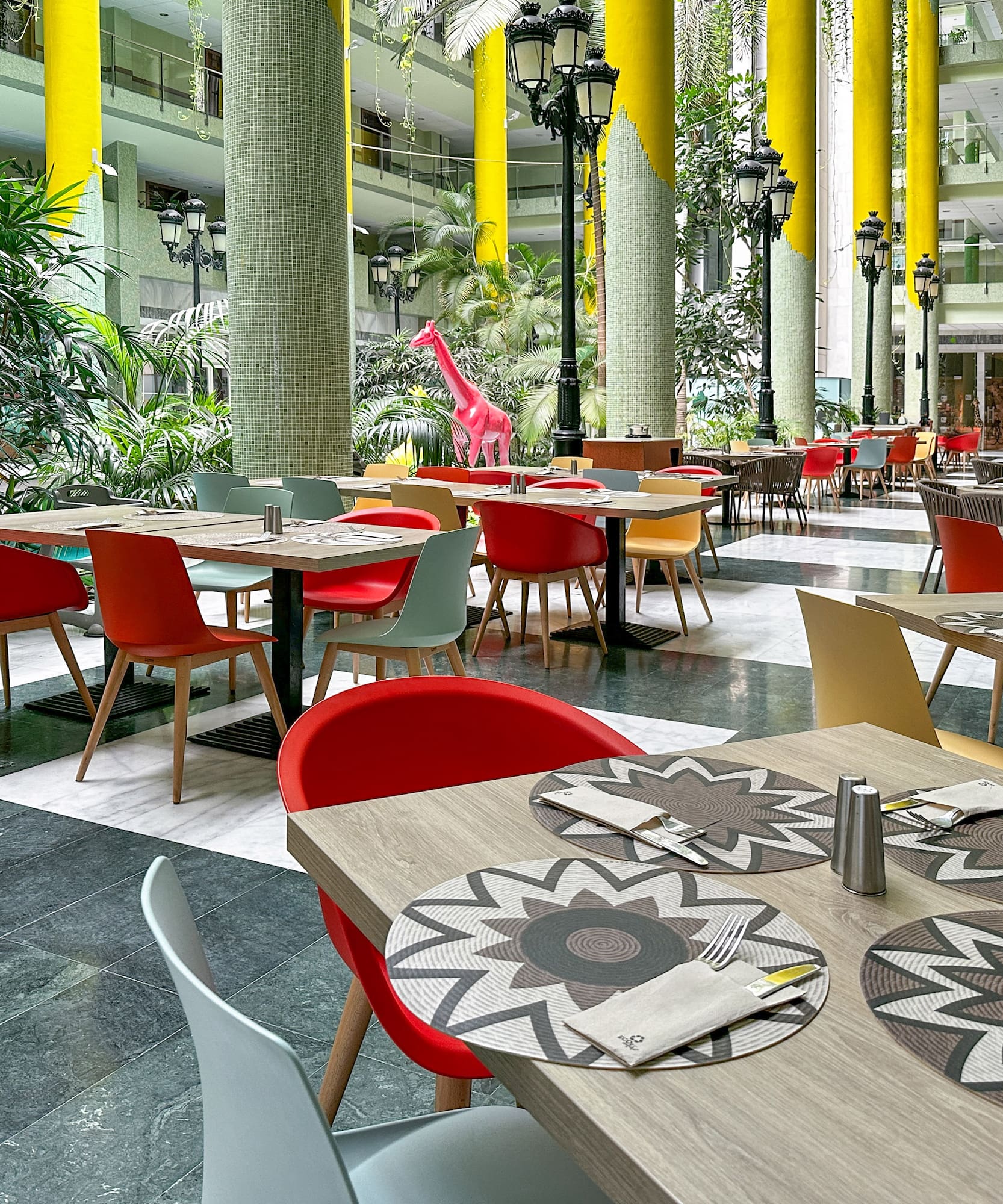 a restaurant with tables and chairs