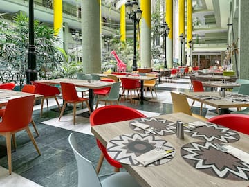 a restaurant with tables and chairs