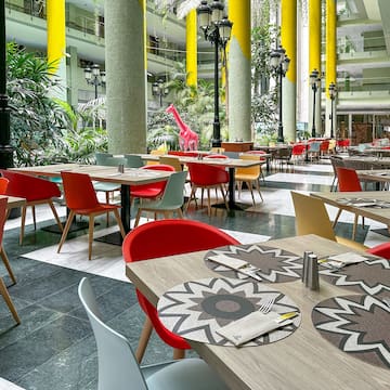 a restaurant with tables and chairs